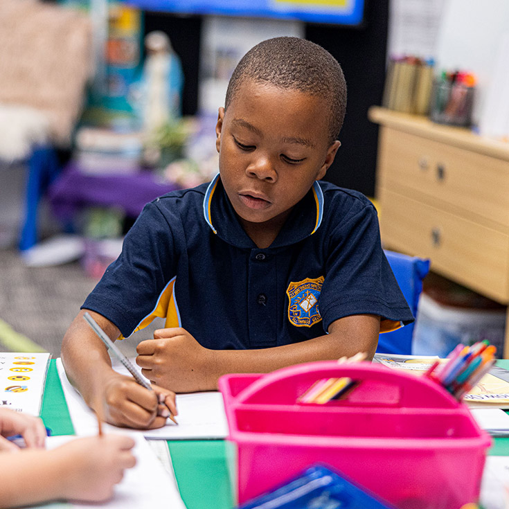 Boy learning at St Matthew's Catholic Primary Windsor